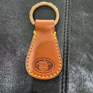 Dooney & Bourke Brown Leather Keychain with Gold Accent